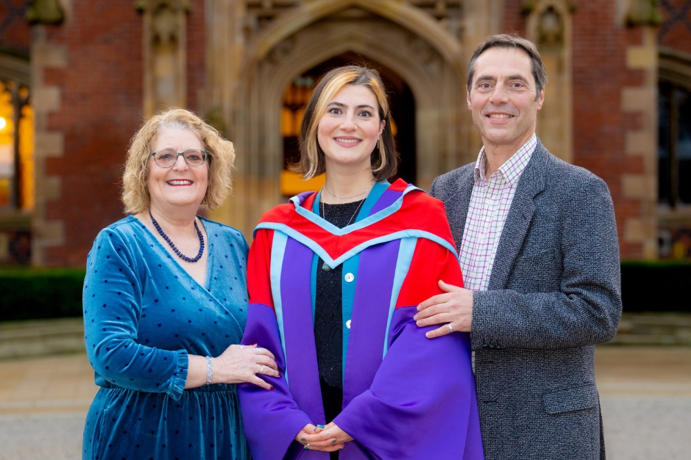 new doctoral graduate and parents celebrating at Winter graduations 2023