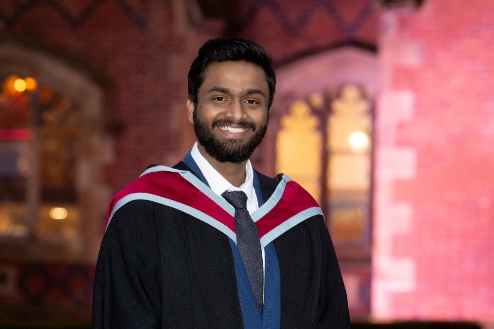 smiling International male graduate at Winter graduation 2023