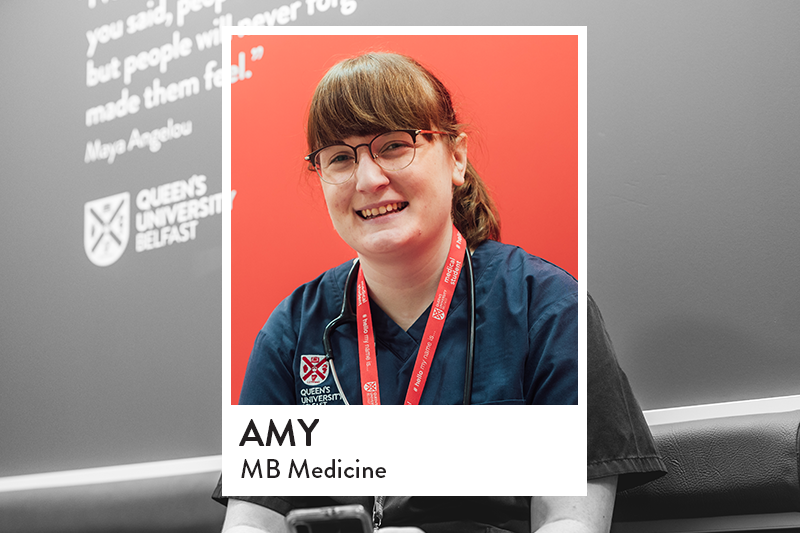 Image of student sitting in InterSim Centre on sofa with red quote wall background