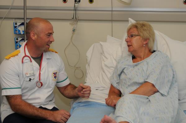 Nursing Male student talking to female