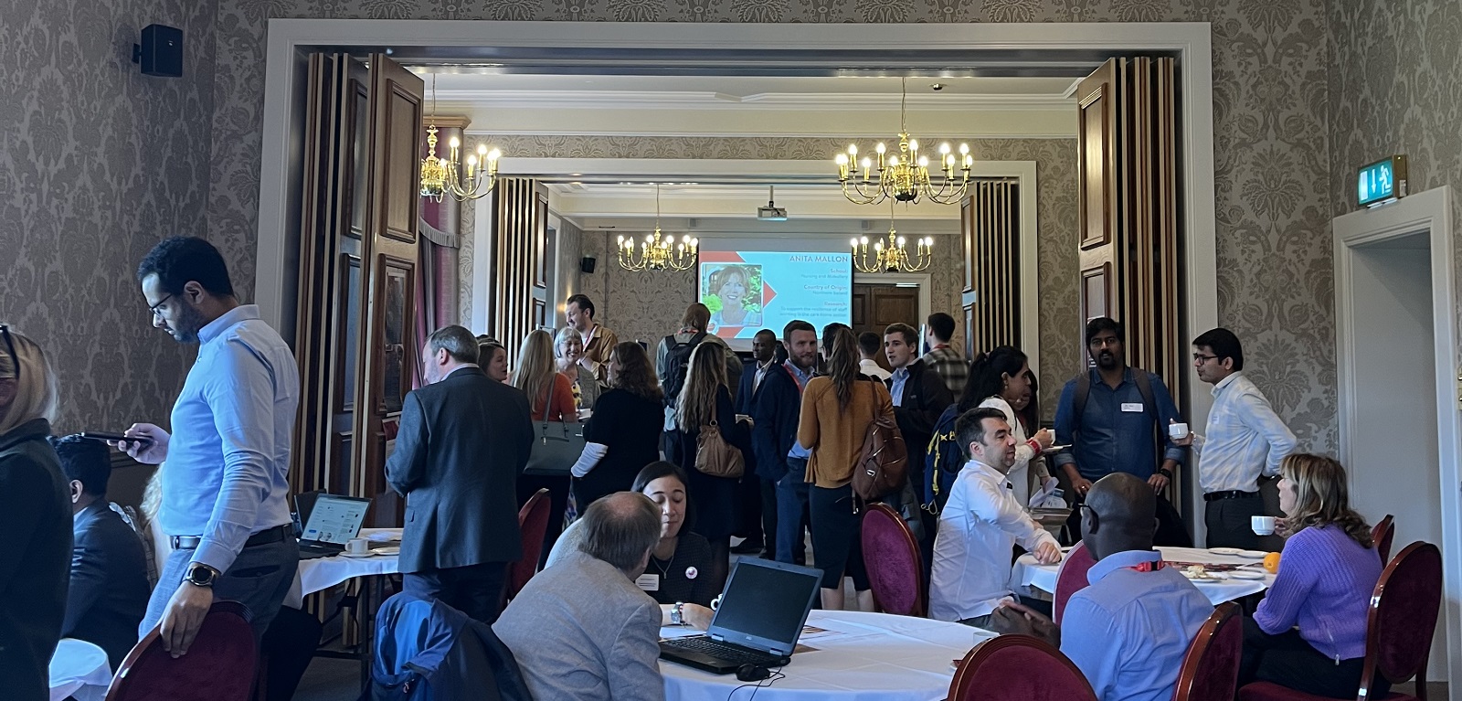 group of postdoctoral students networking in Malone Golf Club