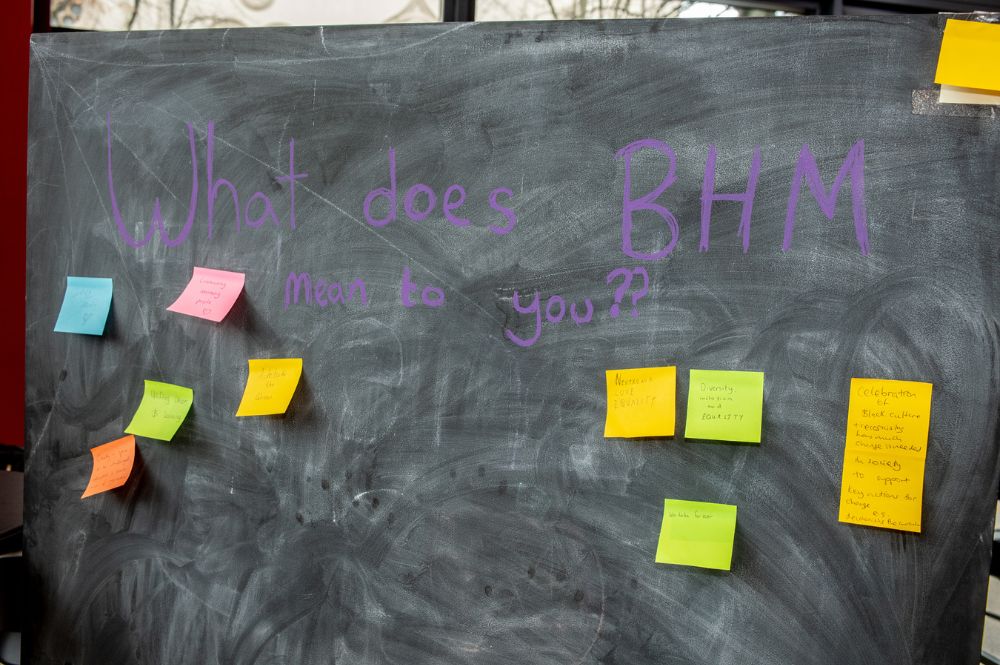 Chalkboard with notes recognising Black students and scholars at Queen's