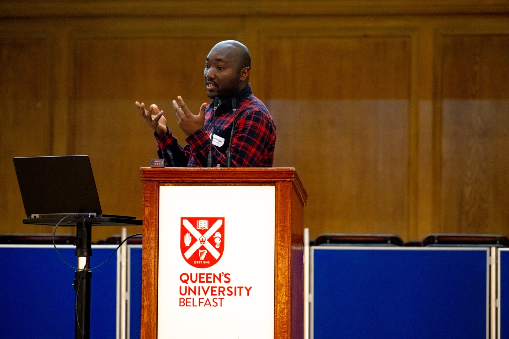 postdoc presenting at Queen's Postdoc Showcase 2023 in the Whitla Hall