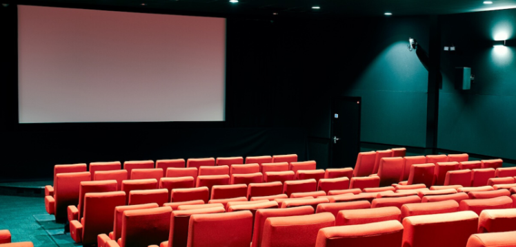 empty cinema screen at Queen's Film Theatre, looking from back towards screen