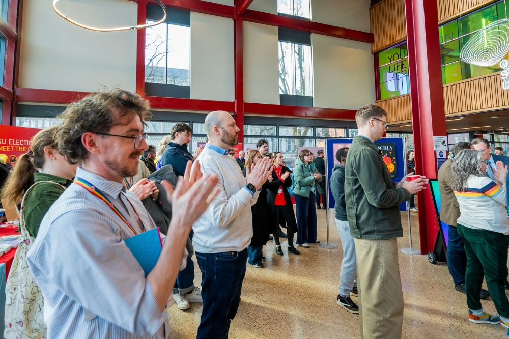 attendees applauding at the LGBTQueen's Celebration Showcase, One Elmwood