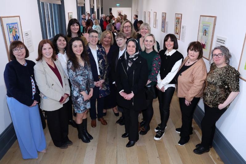 Group photo of the 2025 Portrait Illustration project Nominees in the Naughton Gallery